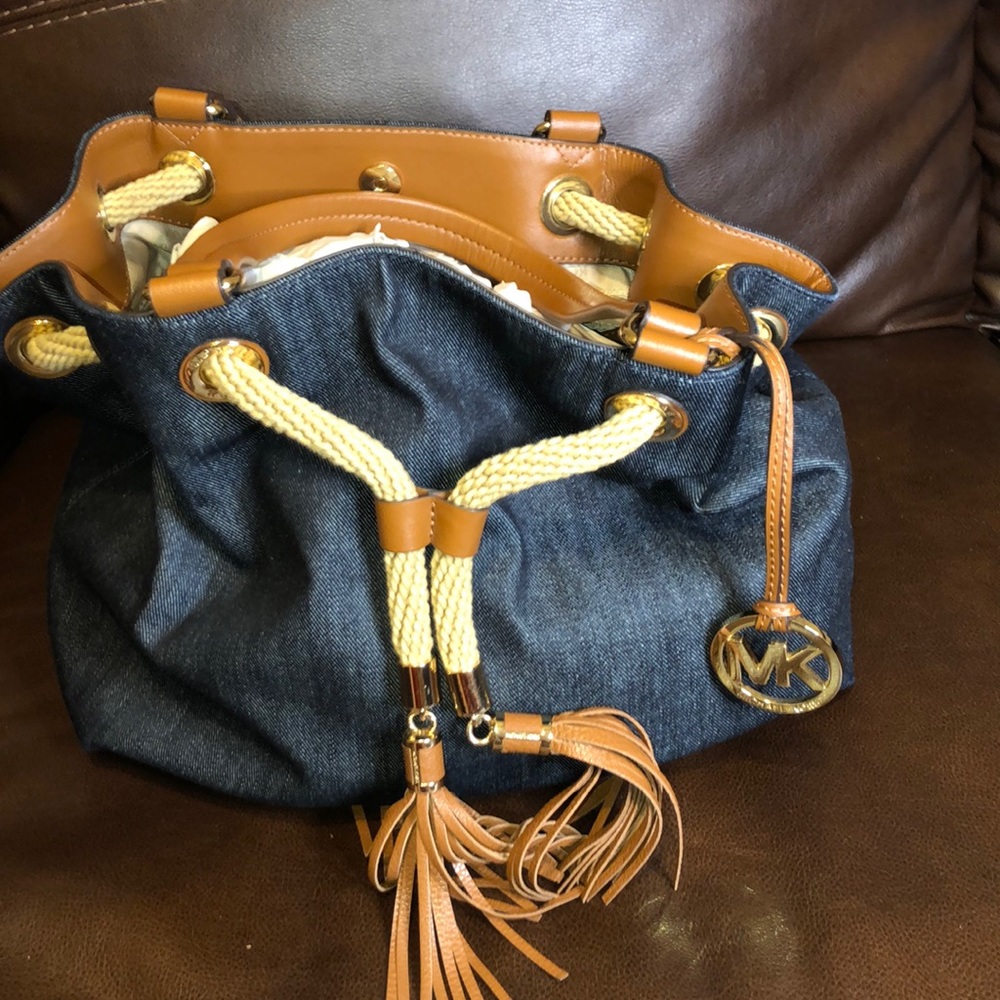 Michel Kors denim purse with brown trimming